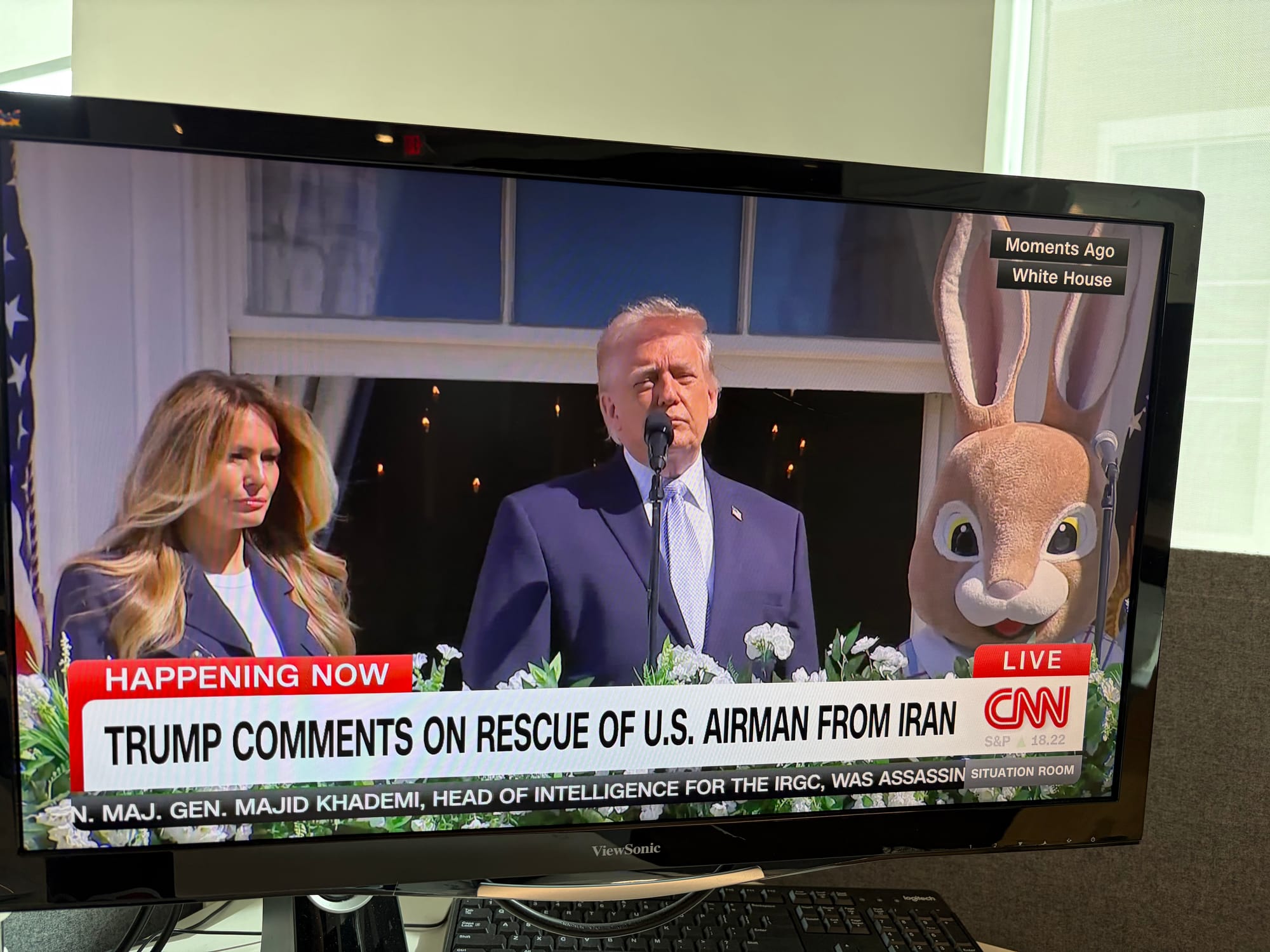 President Trump stands with his wife Melania Trump and the Easter Bunny